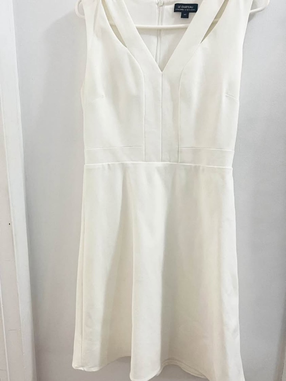 le chateau Ivory V-Neck Sleeveless Mini Dress